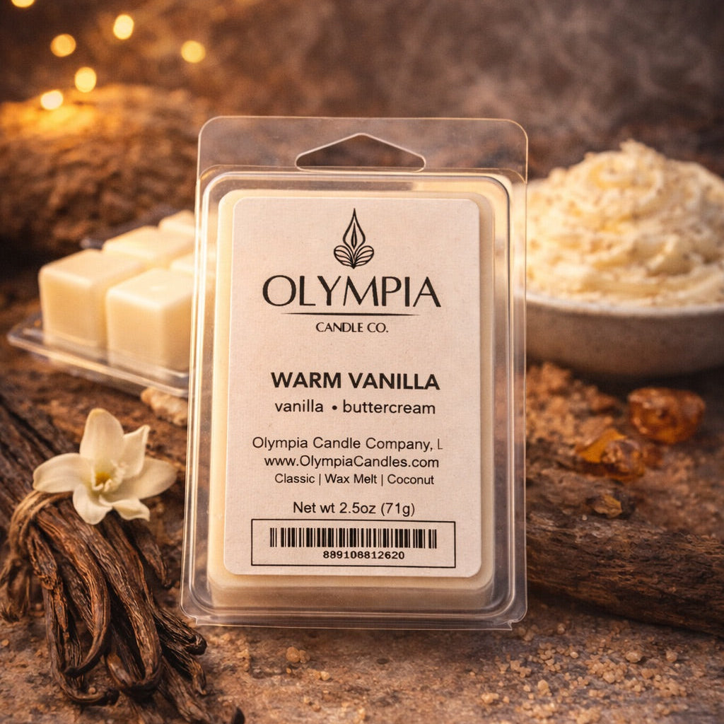 Olympia Candle Co. wax melt package with vanilla beans and flowers on a rustic background