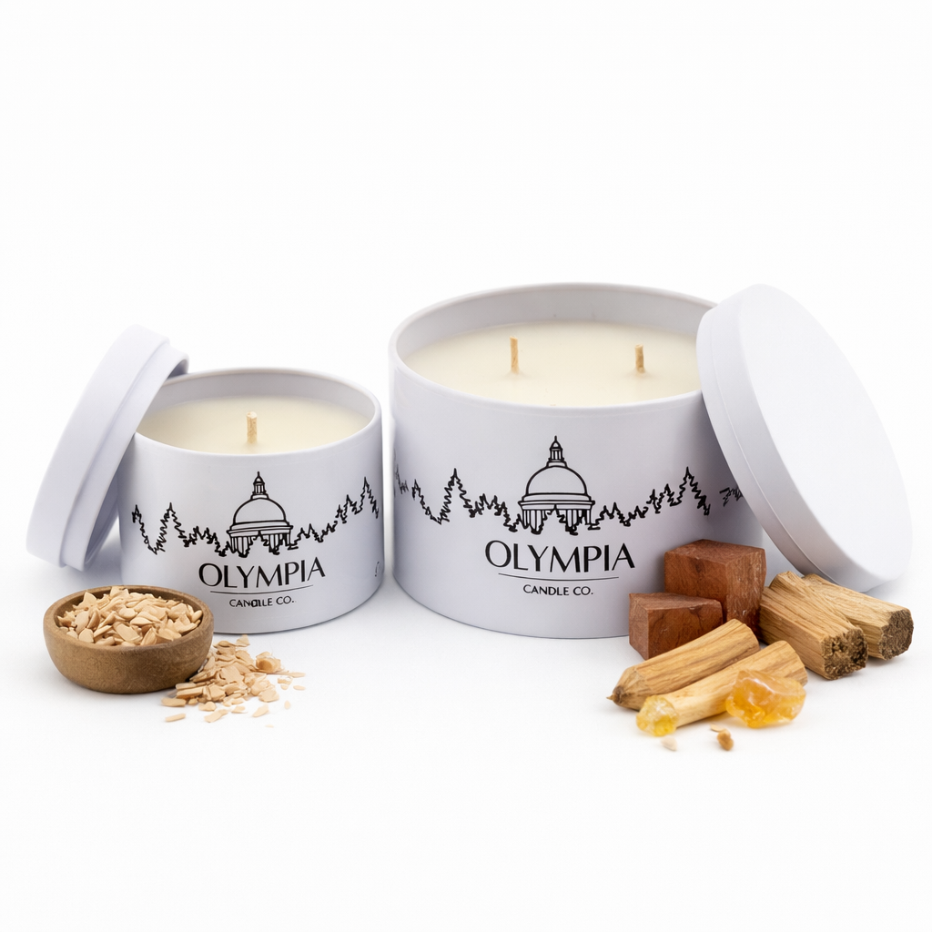 Olympia Candle Co. candles with wooden elements on a white background