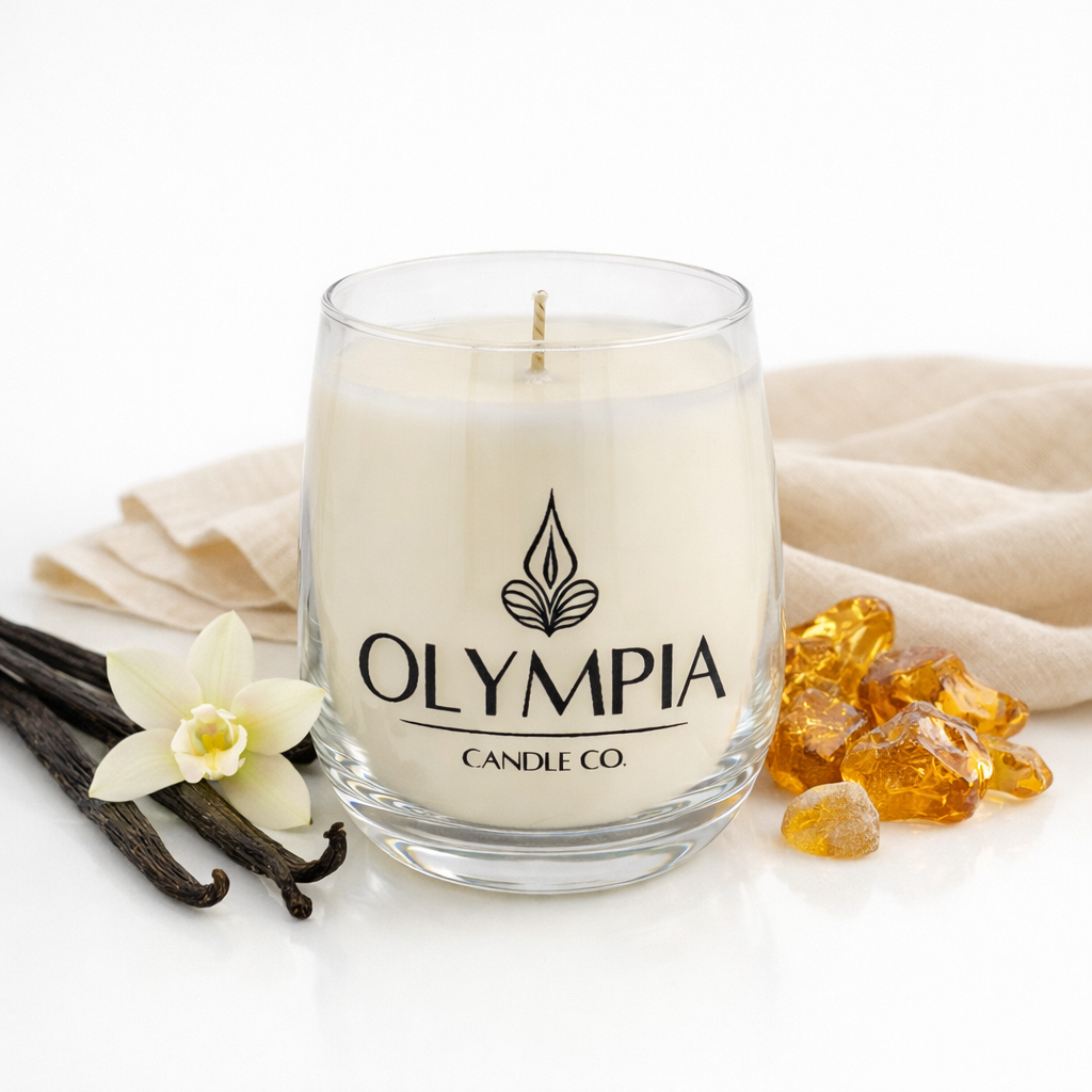 Candle with 'Olympia Candle Co' branding on a white background with vanilla beans and amber gummy bears.